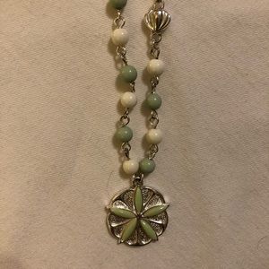 G Comet Sand dollar necklace and earring set